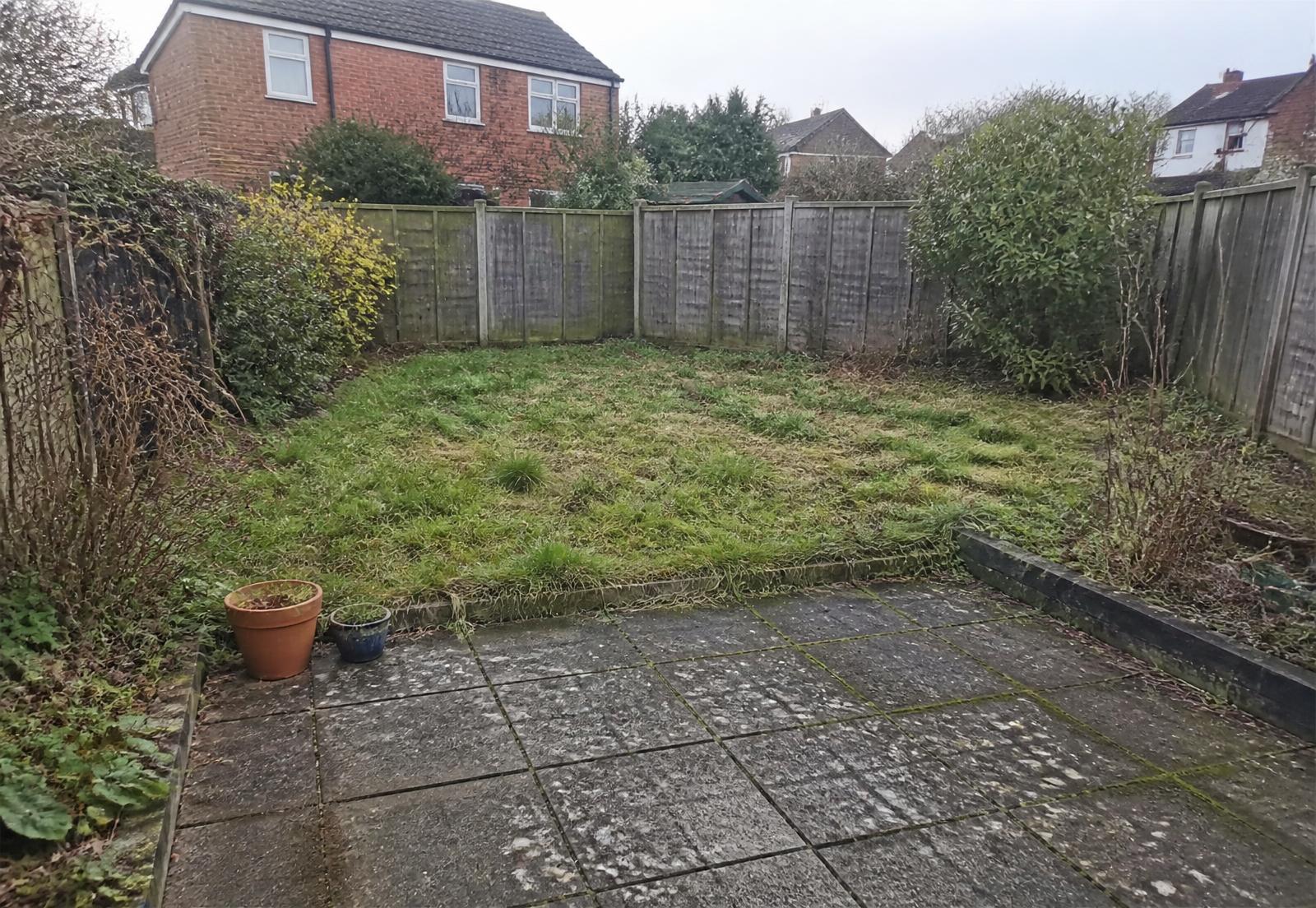 Rear garden before a complete landscaping transformation